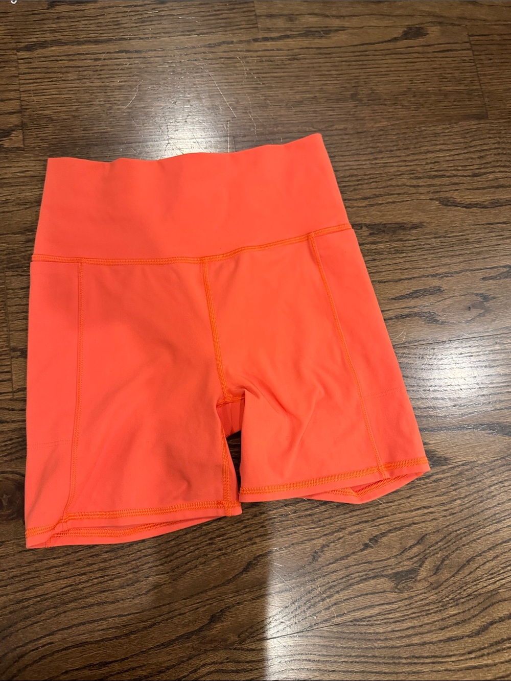 Vuori Neon Coral High-Rise Bike Shorts